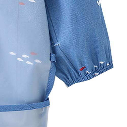 Manche longue et resserrée pour ce tablier enfant motif petit bateau